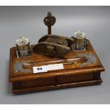 A late Victorian oak inkstand, with later brass trench art tank surmount width 28cm