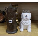 A pair of brass candlesticks, an Arts and Crafts coffee pot and a pair of ceramic dogs