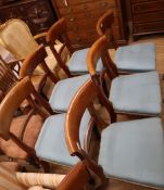 A set of seven mid Victorian mahogany dining chairs