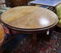 A Victorian mahogany oval extending dining table 182cm extended (one spare leaf)