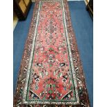 A Hamadan carpet 319 x 105cm