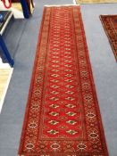 A Turkman carpet 292 x 79cm