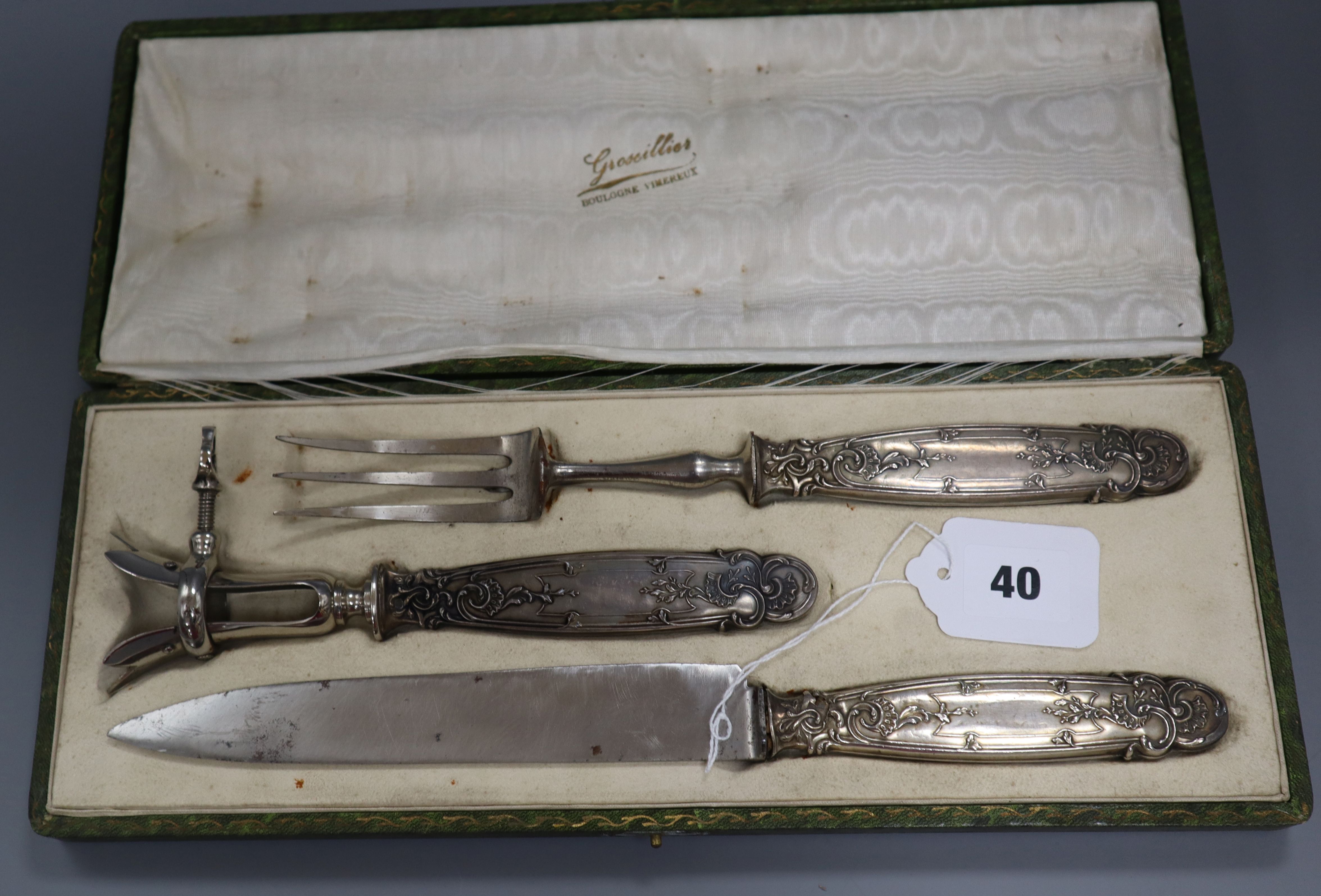 A cased French carving set