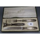 A cased French carving set