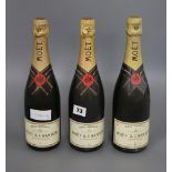 Three bottles of Moet & Chandon champagne