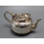 A late Victorian silver squat shaped teapot by Martin, Hall & Co, London, 1891, gross 11.5 oz.
