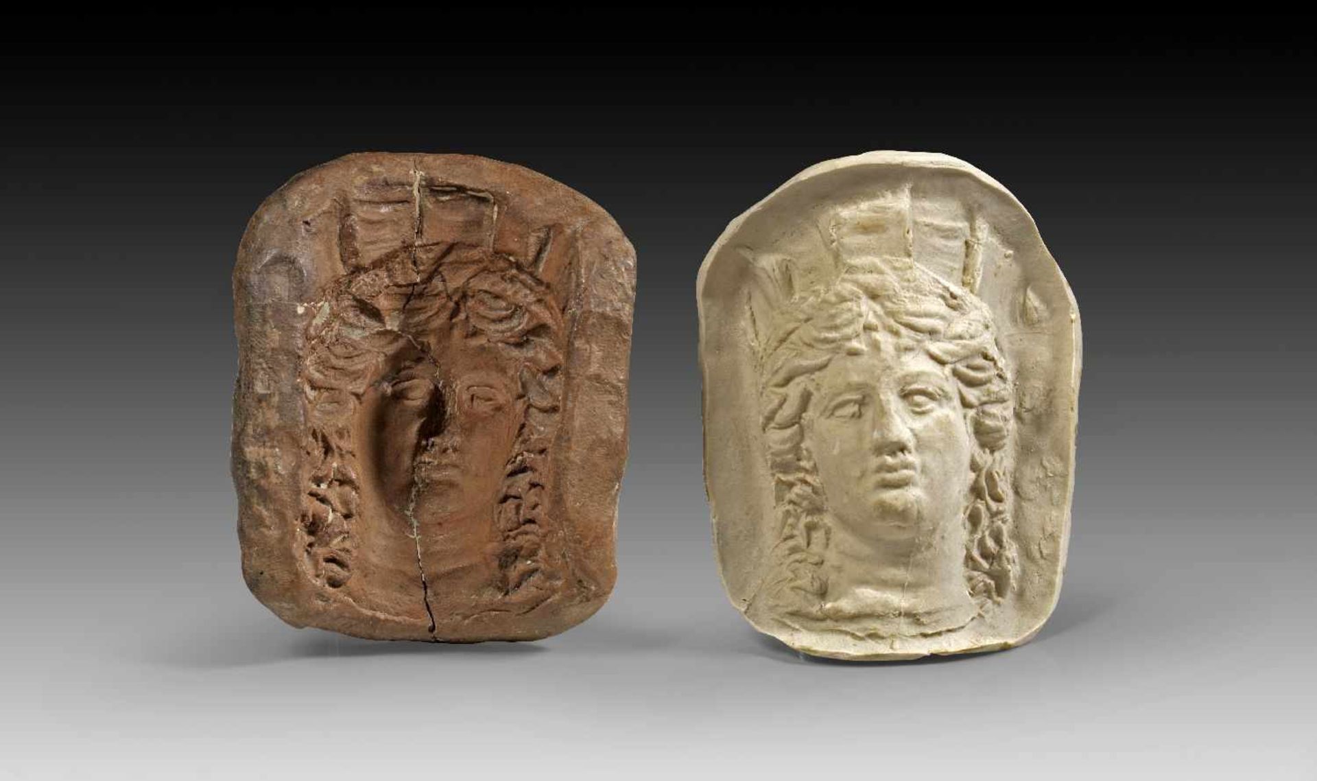 Matrize für den Kopf einer Stadttyche. Griechischer Osten, 2. - 1. Jh. v. Chr. H 9,1cm.