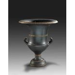 Campanian black-glaze calyx-krater with superposed bright brown clay depicting a laurel-wreath (