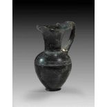 Etruscan Bucchero oinochoe with groove-decor. 625 - 575 B.C. Handle and two rim-fragments are broken