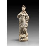 Statuette of a dancing woman in an overcoat. Magna Graecia, 2nd half 4th century B.C. Reassembled