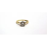 A SINGLE STONE DIAMOND 18 CARAT GOLD RING the illusion set brilliant cut of approximately 0.5