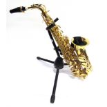 A STAGG 77-SA BRASS SAXOPHONE uncased, on a floor stand.