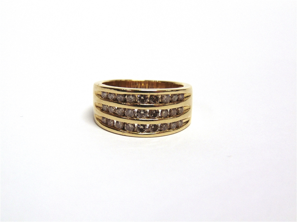 AN 18 CARAT GOLD TWENTY SEVEN STONE DIAMOND RING channel set in three rows with brilliant cuts, - Image 3 of 3