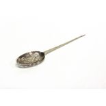AN 18TH CENTURY MOTE SPOON stamped twice with partial makers mark, of usual form, the engraved