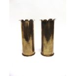 TRENCH ART - A GREAT WAR MATCHED PAIR OF GERMAN BRASS SHELL CASES each dated 1918, decorated with