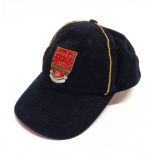 FOOTBALL - AN ARSENAL FOOTBALL CLUB BLUE CAP with badge to the front and Arsenal FC to the back,