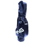 GOLF - A PING G5 GOLF TOUR / TROLLEY BAG the black leather bag with Ping logo and numbers in