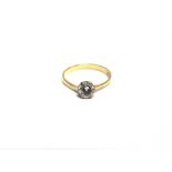 A DIAMOND SOLITAIRE RING the early modern round brilliant approximately 0.70cts, claw set in white