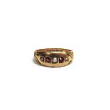 A LATE VICTORIAN 15CT GOLD, RUBY AND HALF-PEARL FIVE STONE GYPSY RING Chester 1900, size M, 2.6g