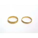 TWO 22CT GOLD WEDDING BANDS each 'D' section, one 4mm wide, Birmingham 1979, size R, 3.5g; the other