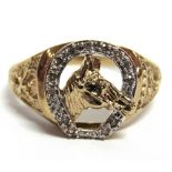 A MODERN 9CT GOLD AND DIAMOND DRESS RING in the form of a horse's head within a tiny eight-cut