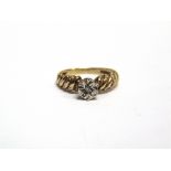 A 9CT GOLD AND TINT DIAMOND SOLITAIRE ILLUSION RING London 1978, size P, 2.8g gross