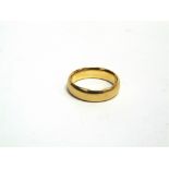 A 22CT GOLD COURT SHAPED WEDDING BAND Birmingham 1930 by Charles Green & Son, size M