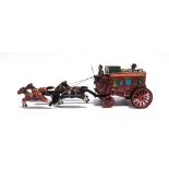 AN ALPS (JAPAN) TINPLATE BATTERY-OPERATED WELLS FARGO STAGE COACH good condition, in working