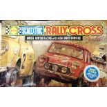 A SCALEXTRIC RALLY CROSS SET comprising two C7, Mini Coopers, boxed, the box worn and with tape-