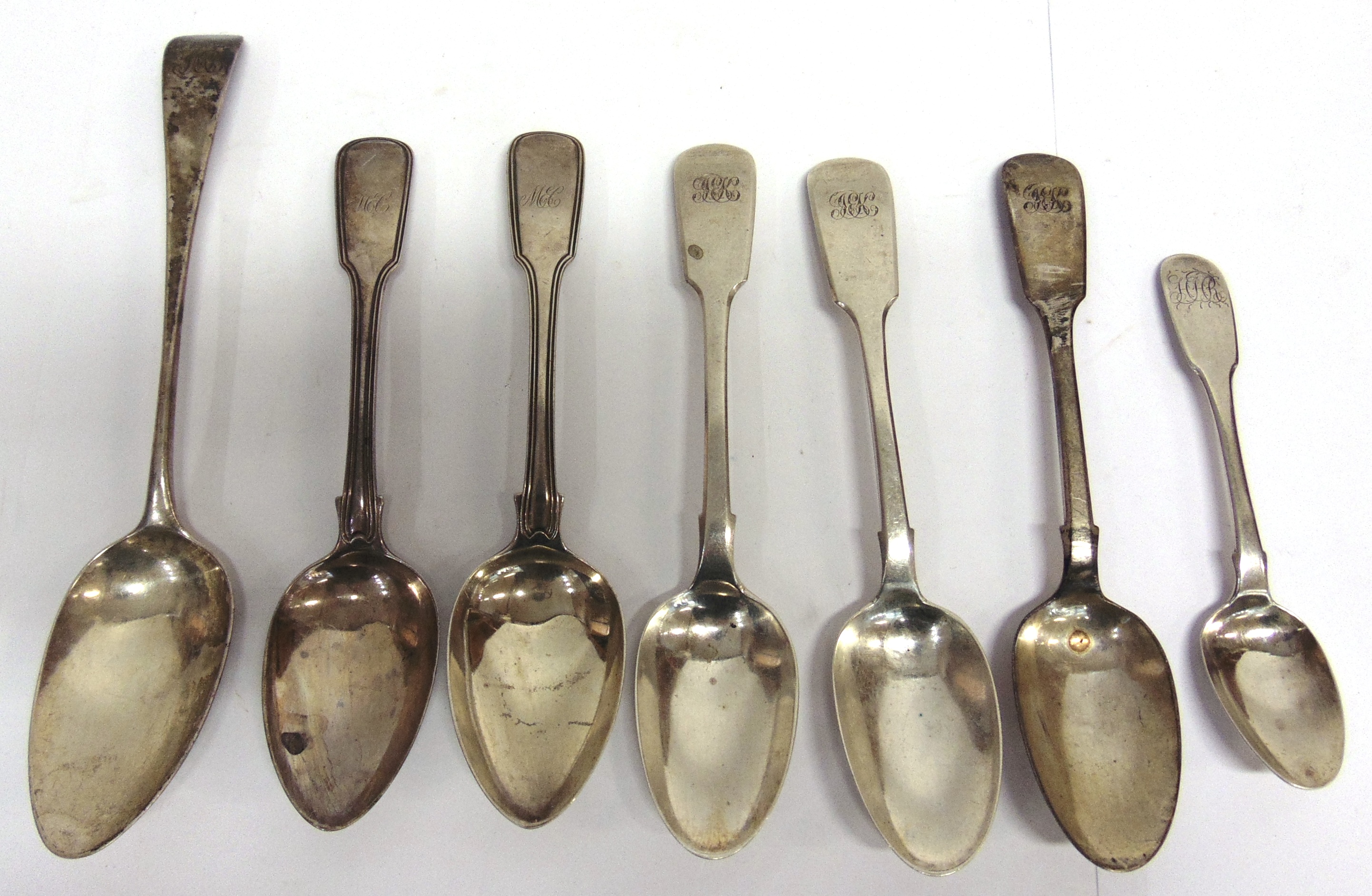 A GEORGE III SILVER OLD ENGLISH PATTERN TABLESPOON by Samuel Davenport, London 1793, monogrammed;