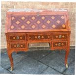 A CONTINENTAL KINGWOOD PARQUETRY DECORATED BUREAU probably Italian, with marble top and fitted