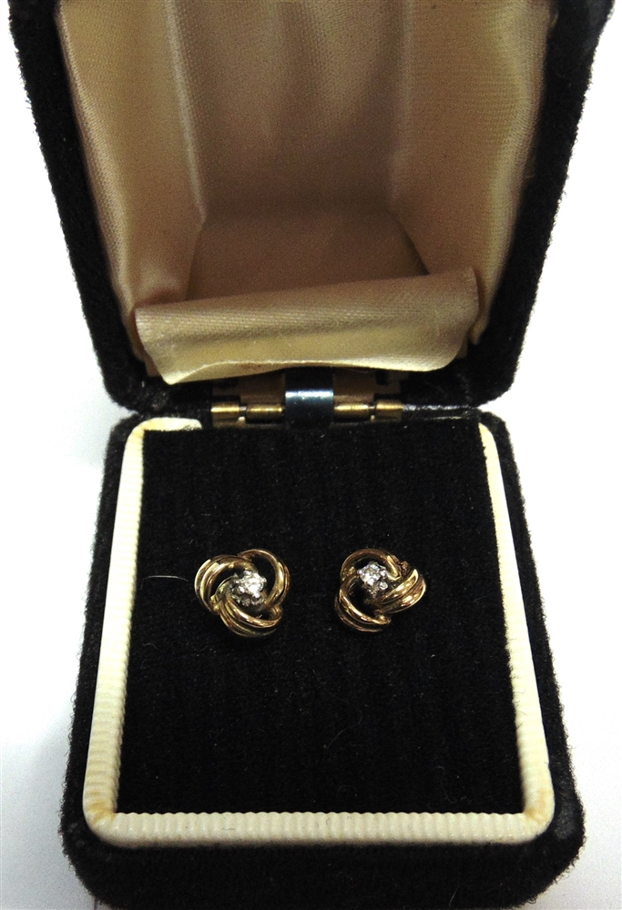 A PAIR OF GOLD AND SMALL DIAMOND KNOT STUD EARRINGS the round brilliant approximately 0.05cts, - Image 2 of 2