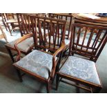 SEVEN MATCHING 19TH CENTURY MAHOGANY DINING CHAIRS including a carver, with drop-in seats on