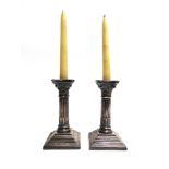 A PAIR OF OLD SHEFFIELD PLATED CORINTHIAN COLUMN CANDLESTICKS with removeable sconces, 17cm high