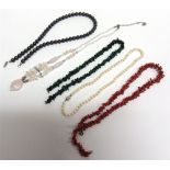 A SMALL COLLECTION OF JEWELLERY including; a red branch coral necklace; a cultured-pearl single