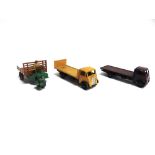 THREE DINKY DIECAST MODEL VEHICLES including two Guy lorries, variable condition, generally fair,