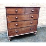 A MAHOGANY CHEST OF TWO SHORT AND THREE LONG DRAWERS with Bramah type locks, on turned supports,