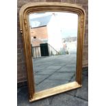 A LARGE GILT FRAMED OVERMANTLE MIRROR 98cm wide 137cm high