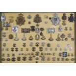 AN IMPRESSIVE COLLECTION OF SOMERSET LIGHT INFANTRY SHAKO, HELMET & CAP BADGES, COLLAR BADGES,