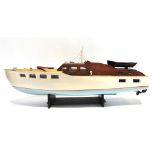 A MODEL RIVER LAUNCH of wooden construction, with a removable cabin section, plank-effect deck,