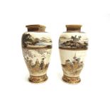 A PAIR OF JAPANESE SATSUMA VASES of baluster form with square necks, painted with a continuous