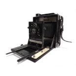 A FOLMER & SCHWING (EASTMAN KODAK) SPEED GRAPHIC PRESS CAMERA with a Voigtlander Anastigmat 'Skopar'