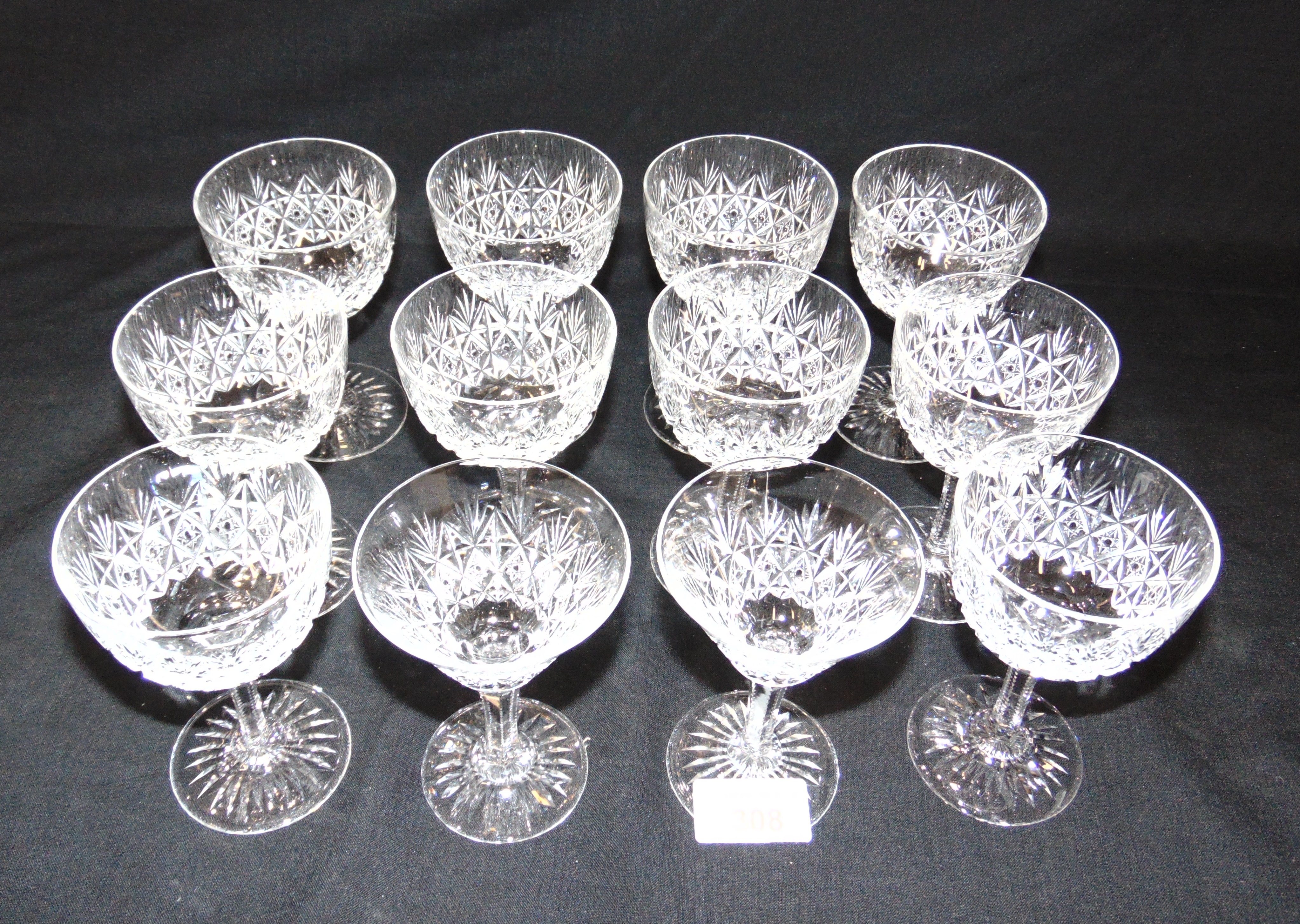 A SET OF 10 THOMAS WEBB 'WELLINGTON' PATTERN WINE GLASSES 12cm high, and a pair of 'Wellington'