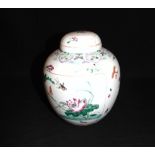 A CHINESE GINGER JAR AND COVER with polychrome enamelled decoration of birds and foliage, 20cm high