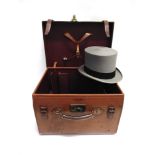 A RECTANGULAR LEATHER FITTED HAT BOX by 'Lincoln Bennett, London', to take four hats, the lid with