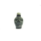 A CHINESE SNUFF BOTTLE with hardstone stopper, 6.5cm high