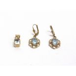 A 9CT GOLD AND RECTANGULAR STEP-CUT PALE BLUE AQUAMARINE PENDANT and a pair of 9ct gold and oval