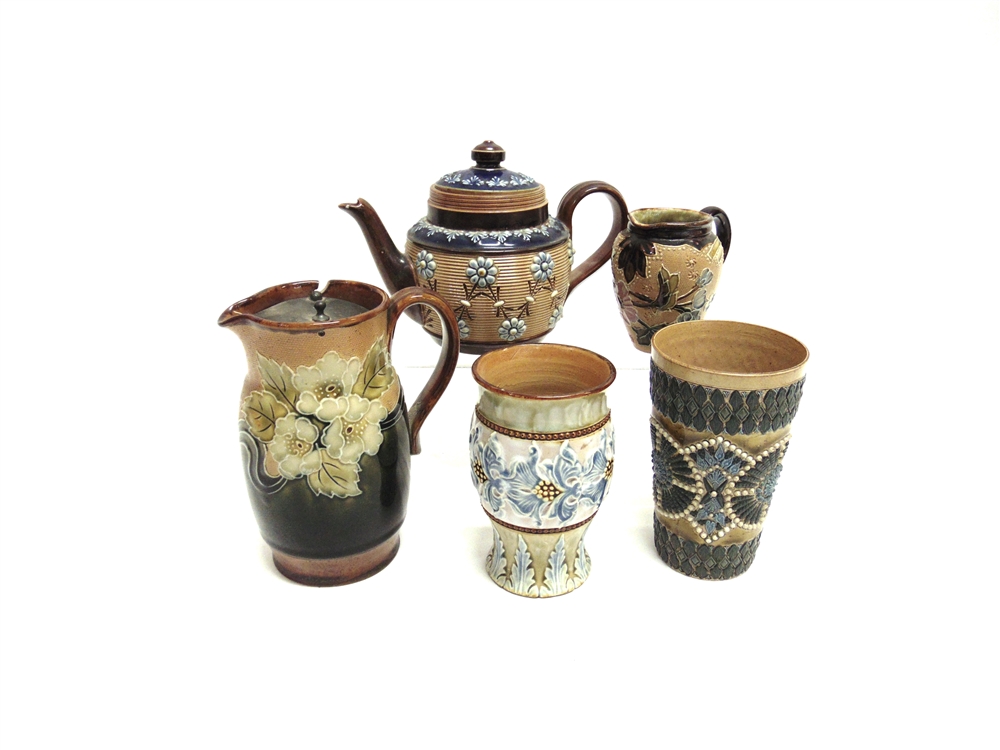 A COLLECTION OF DOULTON STONEWARE comprising a jug with floral tubelined decoration and hinged