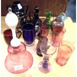 A COLLECTION OF VICTORIAN AND LATER COLOURED GLASSWARE including a cranberry glass bell 28cm high