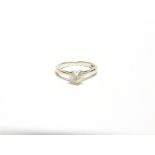 A18 CARAT WHITE GOLD & DIAMOND SINGLE STONE RING the heart cut stone stated as weighing 0.48